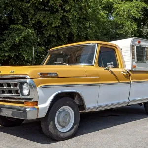 Oldtimer Ford F100 Styleside Sport Custom pickup truck with camping body Oldtimer Ford F100 Styleside Sport Custom pickup truck with camping body