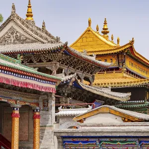 Ornaments and carvings on the roof and front of the Tibetan monastery Kumbum Champa Ling near Xining
