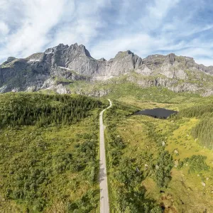 Panoramic aerial view of road in mountain scenery