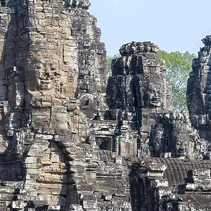 Panoramic picture of huge stone-carved faces of Bodhisattva Lokeshvara