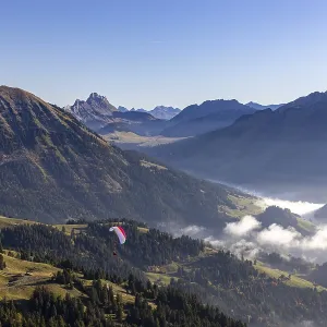 Paragliders, paragliders, taking off at Berneuse summit Paragliders, paragliders, taking off at Berneuse summit