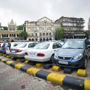 Parking lot at Kalaghoda and old architecture buildings of Bombay Mumbai Parking lot at Kalaghoda and old architecture buildings of Bombay Mumbai