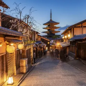 Pedestrian in an alleyway, Yasaka dori historical alleyway in the old town with traditional Japanese houses Pedestrian in an alleyway, Yasaka dori historical alleyway in the old town with traditional Japanese houses