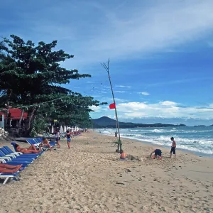 People, deckchairs, Chaweng Beach on Ko Samui People, deckchairs, Chaweng Beach on Ko Samui