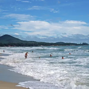 People, sea, surf, Chaweng Beach on Ko Samui People, sea, surf, Chaweng Beach on Ko Samui