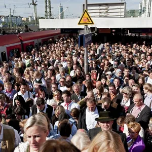 Many people on their way to the Wiesn or Oktoberfest grounds Many people on their way to the Wiesn or Oktoberfest grounds
