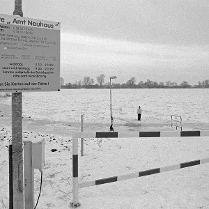 Person on ice rink, ferry dock