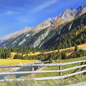 Picturesque mountain valley. Rough stream Picturesque mountain valley. Rough stream