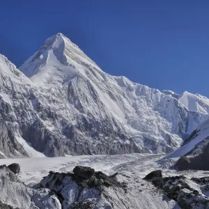 Picturesque view of Engilchek glacier with peaks of Tian Shan mountain range in Kyrgyzstan