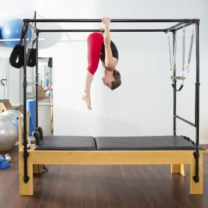 Pilates aerobic instructor woman in cadillac fitness exercise