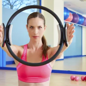 Pilates woman magic ring hands exercise workout at gym indoor Pilates woman magic ring hands exercise workout at gym indoor
