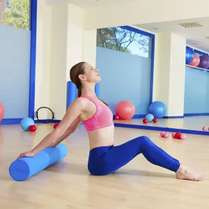 Pilates woman roller exercise workout at gym indoor Pilates woman roller exercise workout at gym indoor