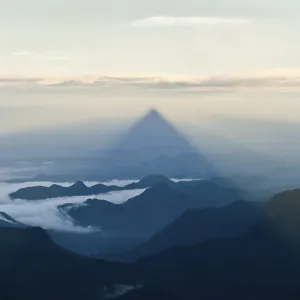 Pilgrim mountain, sun creating a triangle shadow in the landscape
