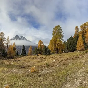 Piz Daint with a wreath of clouds