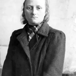 Poor woman in a coat, post-war period Poor woman in a coat, post-war period
