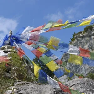 Prayer flags behind Hochgernhaus mountain hut Prayer flags behind Hochgernhaus mountain hut