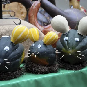 Three pumpkins designed as mice Three pumpkins designed as mice