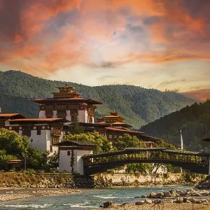 Punakha Dzong at sunset with the Mo Chhu river in Bhutan Punakha Dzong at sunset with the Mo Chhu river in Bhutan