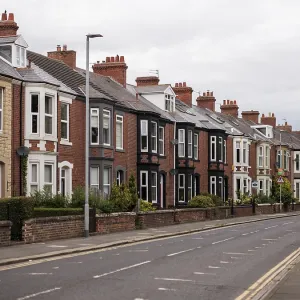 A quiet residential street featuring a row of traditional terraced houses in Blyth A quiet residential street featuring a row of traditional terraced houses in Blyth