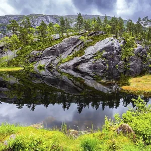 Quiet small lake next to the road