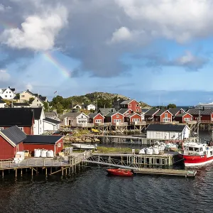 Rainbow over Rorbuer cabins in Reine Rainbow over Rorbuer cabins in Reine
