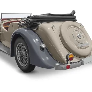 Rear view of a classic car isolated in white back with shadow