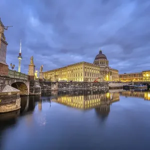The rebuilt Berlin City Palace with the TV Tower at dusk