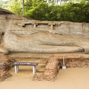 Reclining Buddha statue, which depicts the Buddha's Parinirvana Reclining Buddha statue, which depicts the Buddha's Parinirvana