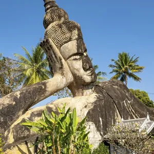 Reclining Buddha statue at Xieng Khuan Buddha Park Reclining Buddha statue at Xieng Khuan Buddha Park