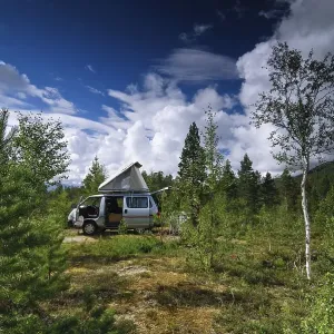 Recreational vehicle in typical landscape
