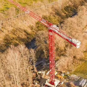 Red crane on a construction site Red crane on a construction site