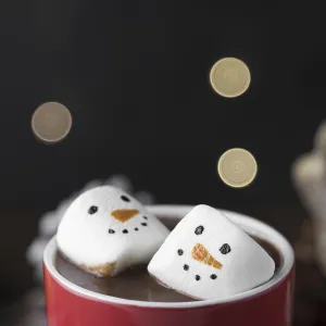 Red cup hot chocolate with marshmallows close up