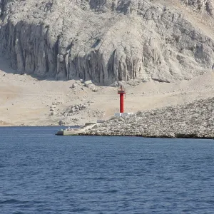 Red see light on island with mountain background