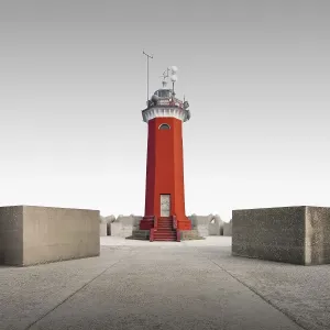 Red lighthouse on the coast of Venice