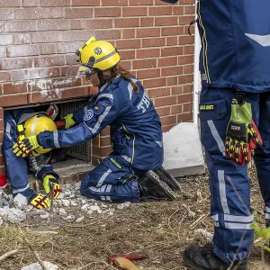 Rescue and recovery of people after a drone attack on a residential building in a civil defence scenario