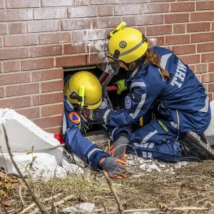 Rescue and recovery of people after a drone attack on a residential building in a civil defence scenario