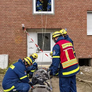Rescue and recovery of people after a drone attack on residential buildings in a civil defence scenario