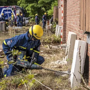 Rescue and recovery of people after a drone attack on residential buildings in a civil defence scenario