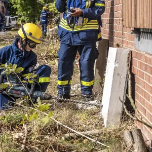 Rescue and recovery of people after a drone attack on residential buildings in a civil defence scenario