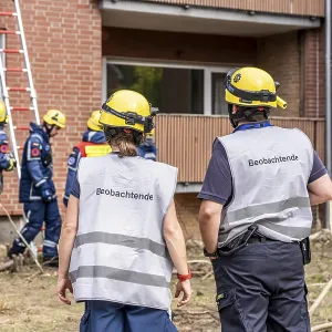 Rescue and recovery of people after a drone attack on residential buildings in a civil defence scenario