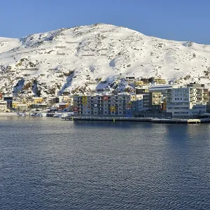 Residential building directly on the waterfront of a bay Residential building directly on the waterfront of a bay