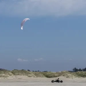 Ringby, Denmark - 30 May, 2021: kite buggy enjoying a windy day on the Wadden Sea island beaches of western Denmark