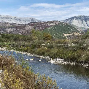 River course with mountain backdrop in the valley of Mesopotamia