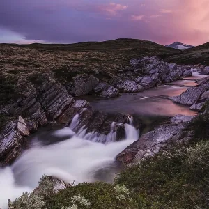 River Stropla after sunset, Snohetta mountain behind River Stropla after sunset, Snohetta mountain behind