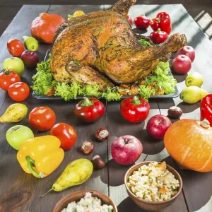 Roasted turkey with vegetables wooden table