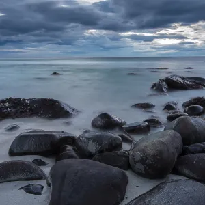 Rocks on the beach, sunset, Unstad Rocks on the beach, sunset, Unstad