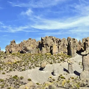 The rocky mountain top consists of porous vertical aged red granite stones The rocky mountain top consists of porous vertical aged red granite stones