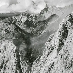 Rocky ridge of Hohe Munde, in the background mountain peaks Hoher Kamm and Kleiner Wanner of the Wetterstein Mountains Rocky ridge of Hohe Munde, in the background mountain peaks Hoher Kamm and Kleiner Wanner of the Wetterstein Mountains