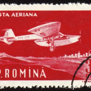 ROMANIA - CIRCA 1960: A stamp printed in Romania shows flying vintage ambulance plane ROMANIA - CIRCA 1960: A stamp printed in Romania shows flying vintage ambulance plane