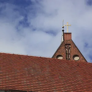 Roof covered with beaver tail tiles in double roof Roof covered with beaver tail tiles in double roof